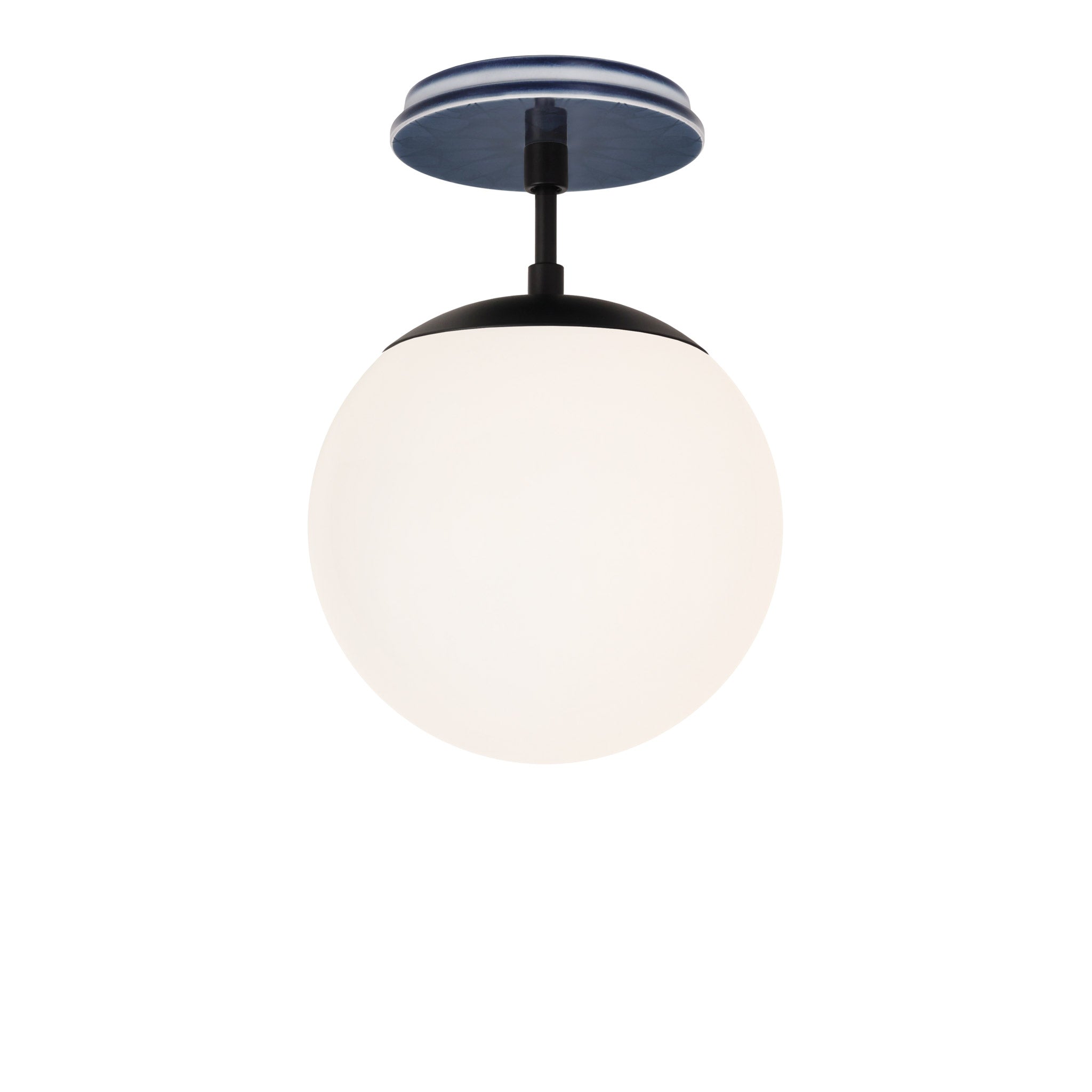 Alto Surface 8" shown in Matte Black with an Indigo Blue Star Ceramic Canopy