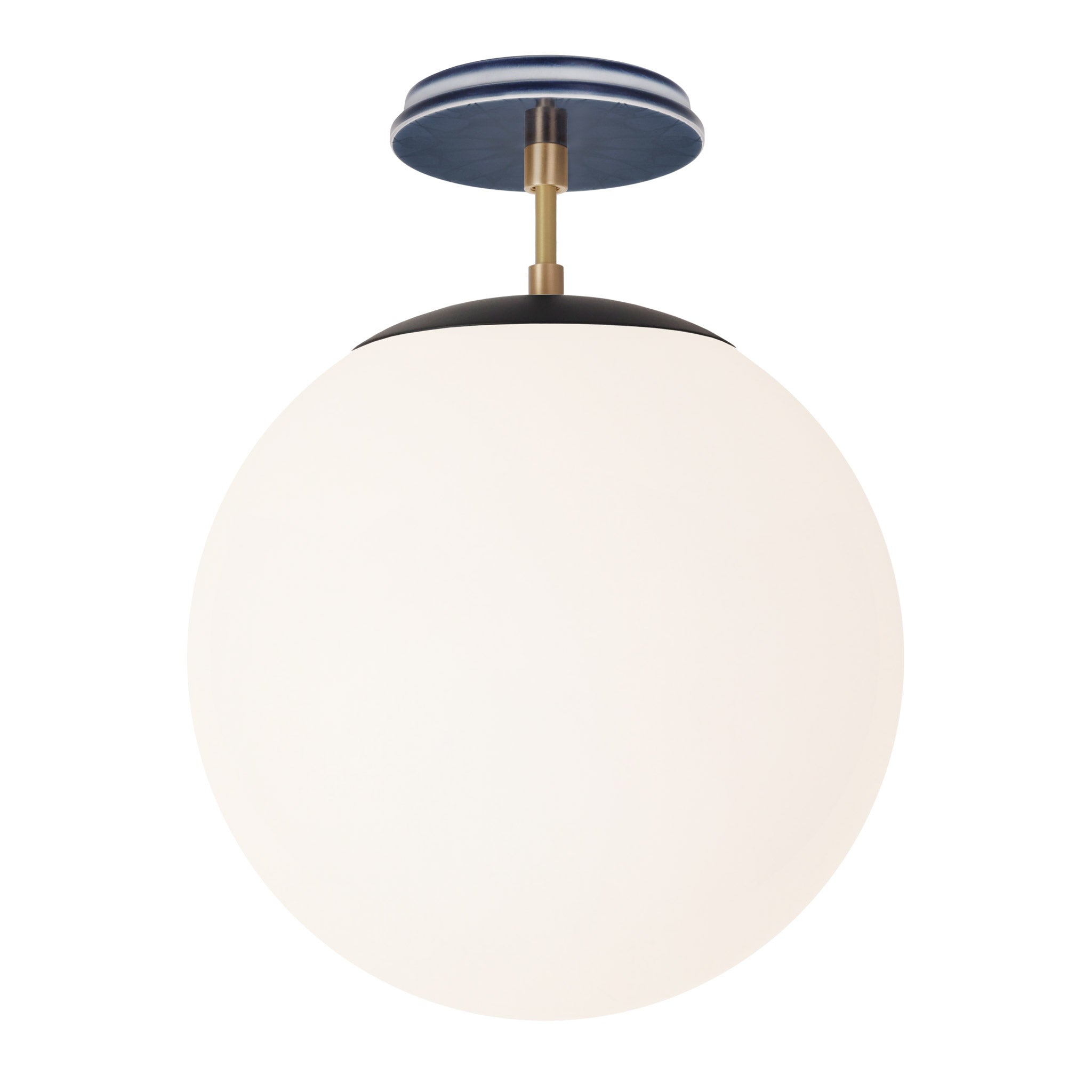 Alto Surface 12” shown in Matte Black with Brass and an Indigo Blue Star Ceramic Canopy