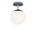 Alto Surface 8" shown in Matte Black with Brass and an Indigo Blue Star Ceramic Canopy