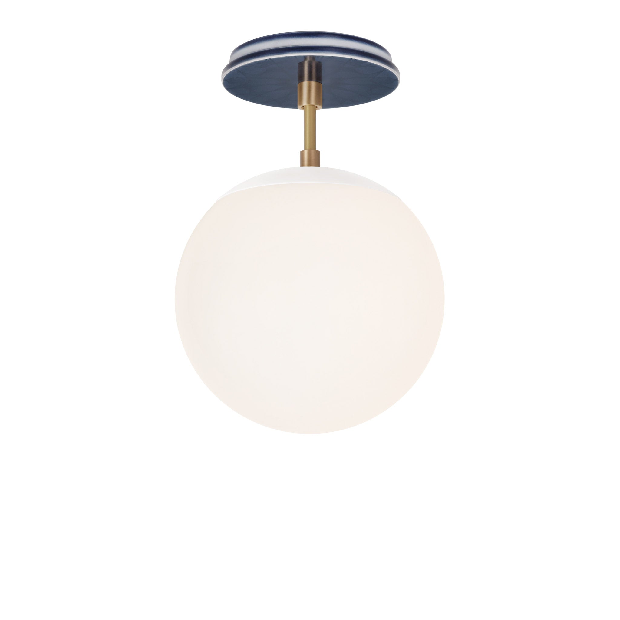Alto Surface 8" shown in White with Brass and an Indigo Blue Star Ceramic Canopy