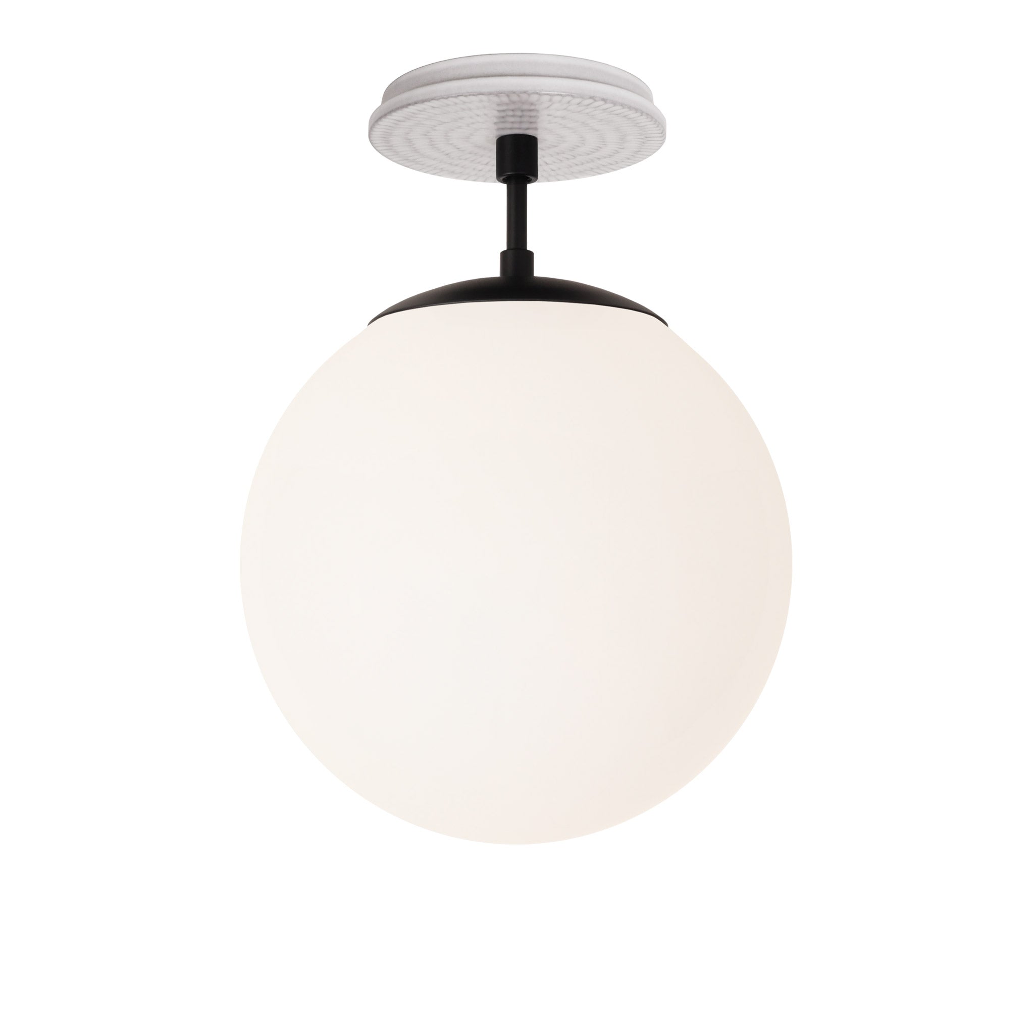 Alto Surface 10” shown in Matte Black with a Brownstone White Sunflower Ceramic Canopy