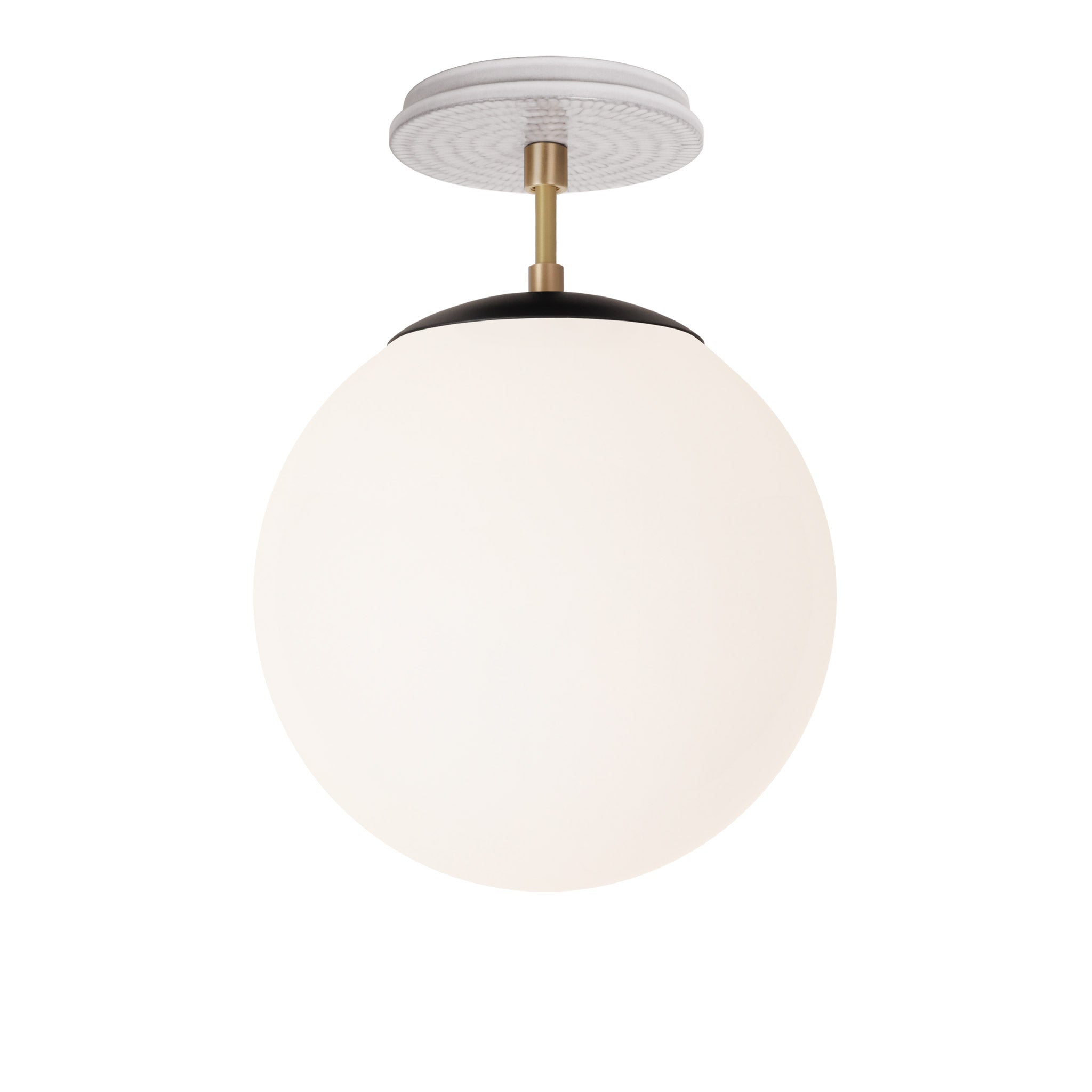 Alto Surface 10” shown in Matte Black with Brass and a Brownstone White Sunflower Ceramic Canopy