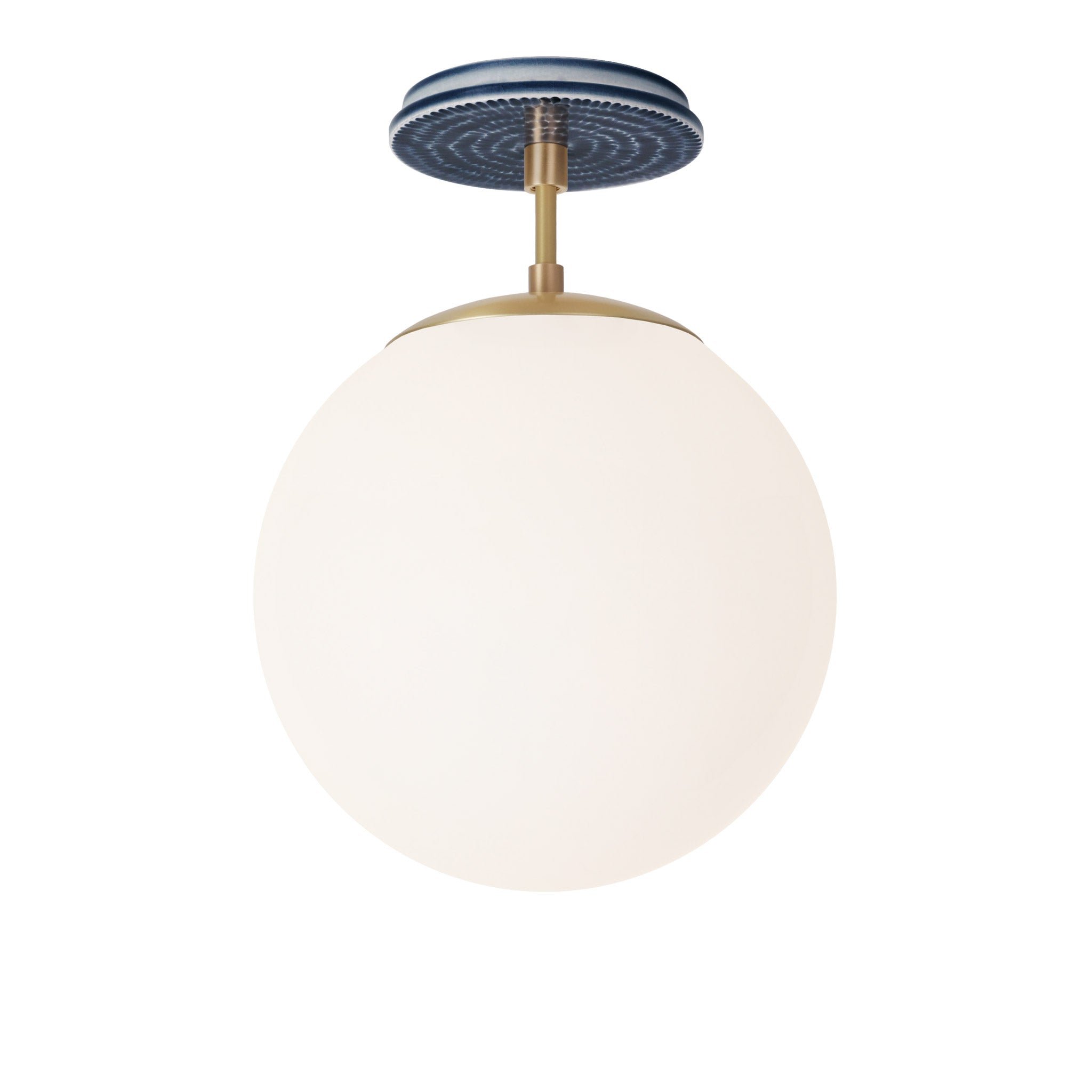 Alto Surface 10” shown in Brass with an Indigo Blue Sunflower Ceramic Canopy