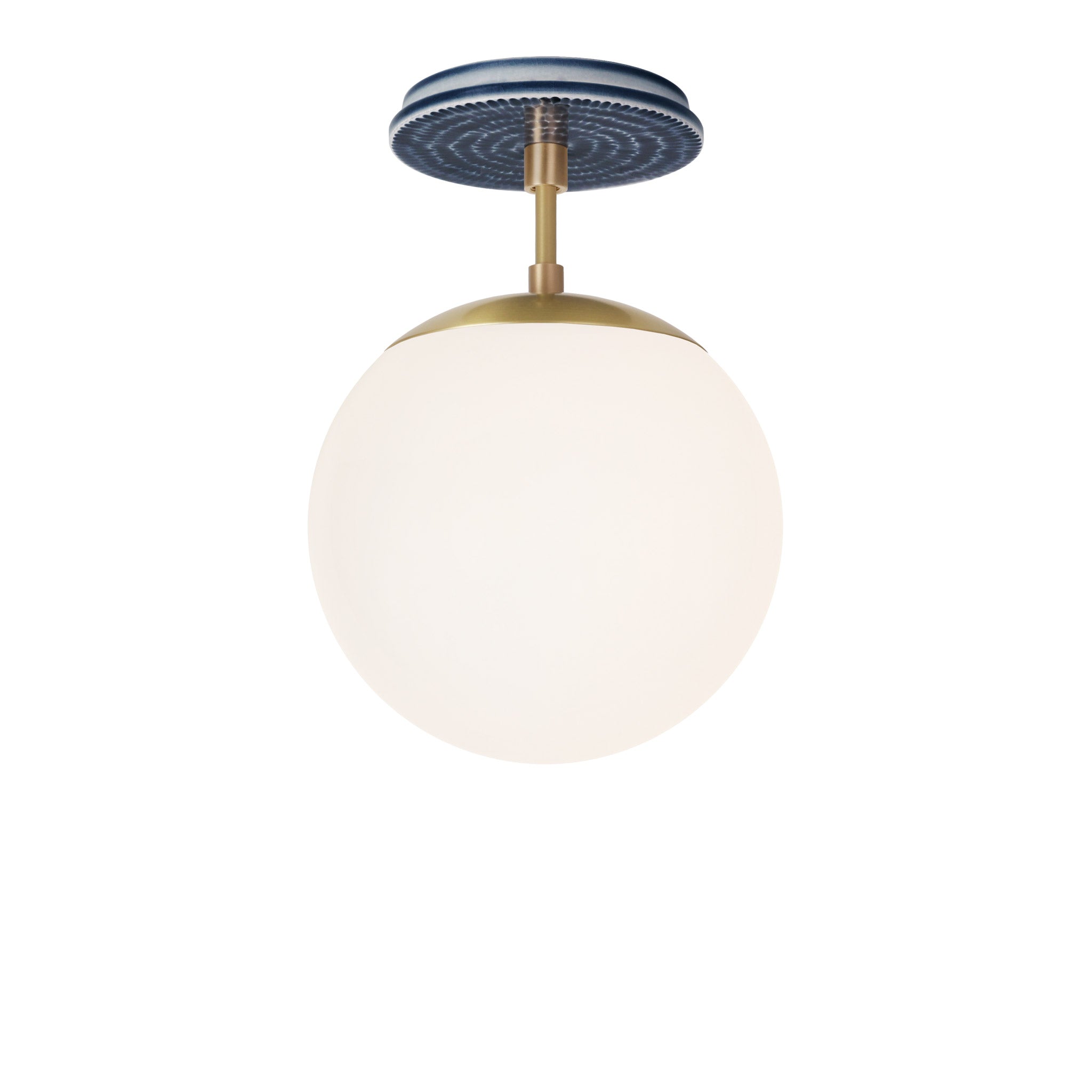 Alto Surface 8" shown in Brass with an Indigo Blue Sunflower Ceramic Canopy