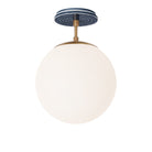 Alto Surface 10” shown in Heirloom Brass with an Indigo Blue Sunflower Ceramic Canopy