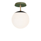 Alto Surface 8" shown in Matte Black with Brass and a Forest Green Swift Ceramic Canopy