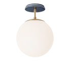 Alto Surface 10” shown in Brass with an Indigo Blue Swift Ceramic Canopy