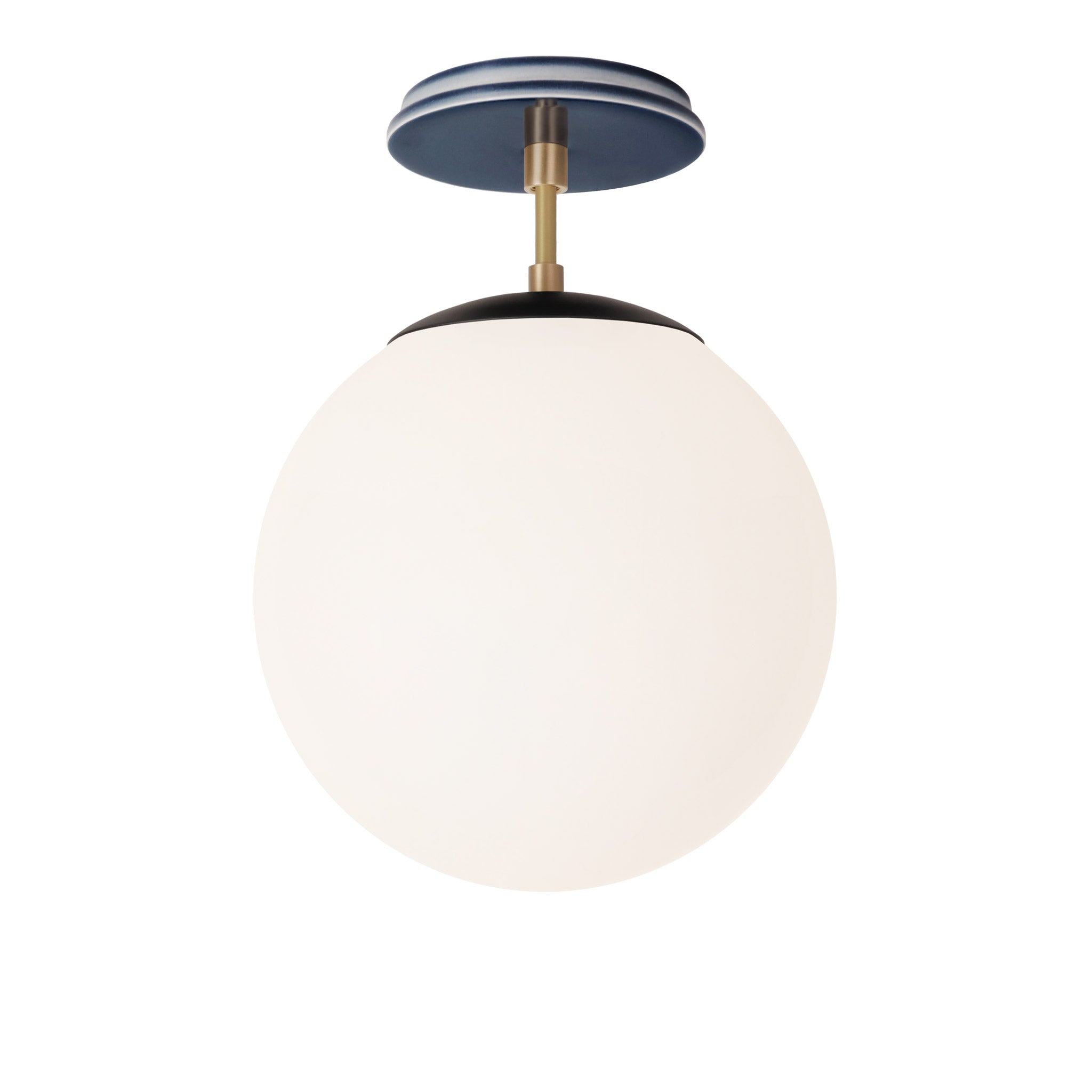 Alto Surface 10” shown in Matte Black with Brass and an Indigo Blue Swift Ceramic Canopy