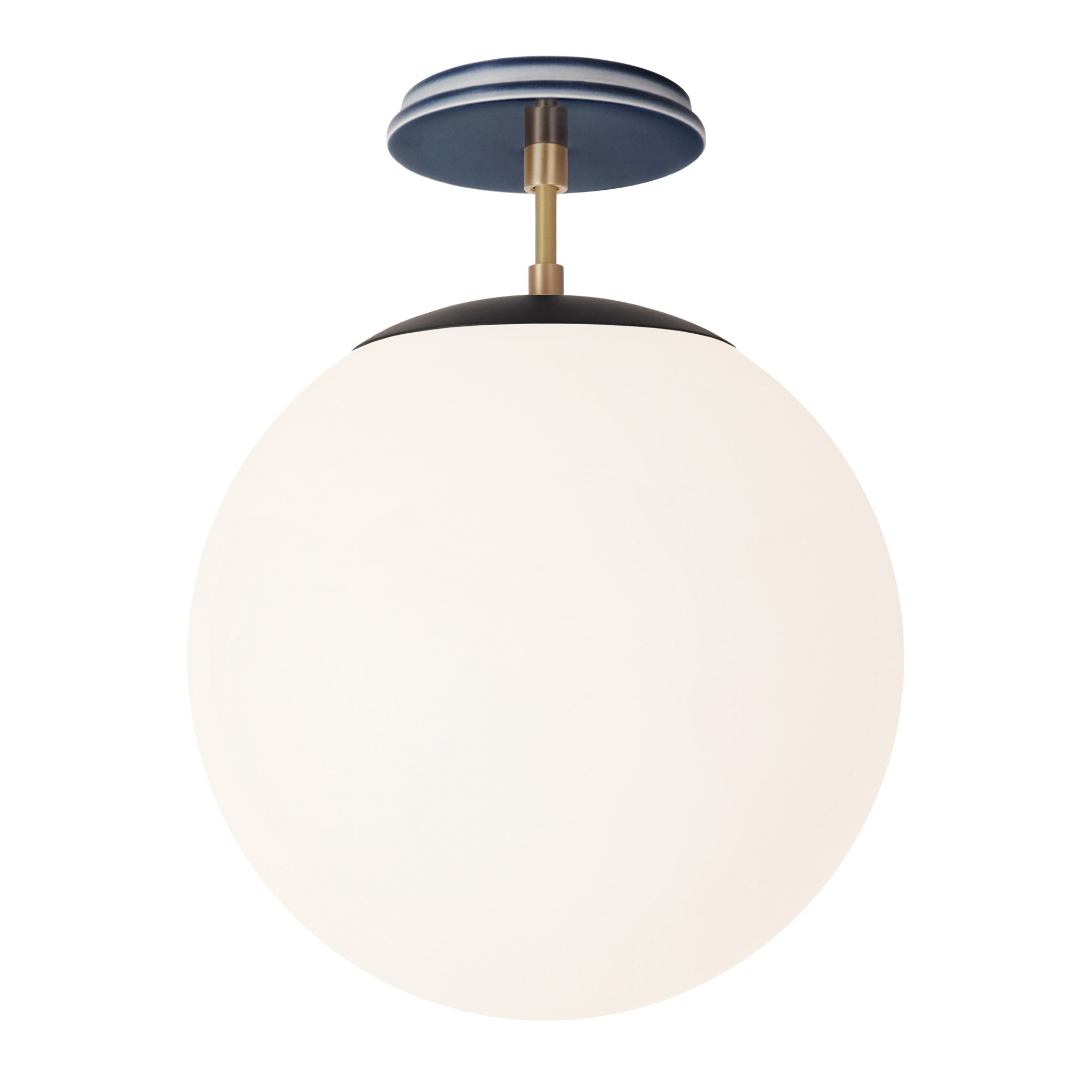 Alto Surface 12” shown in Matte Black with Brass and an Indigo Blue Swift Ceramic Canopy