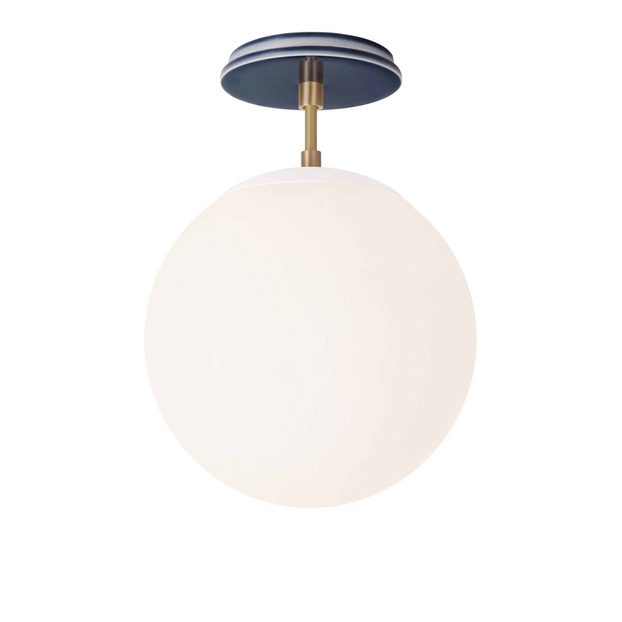 Alto Surface 10” shown in White with Brass and an Indigo Blue Swift Ceramic Canopy