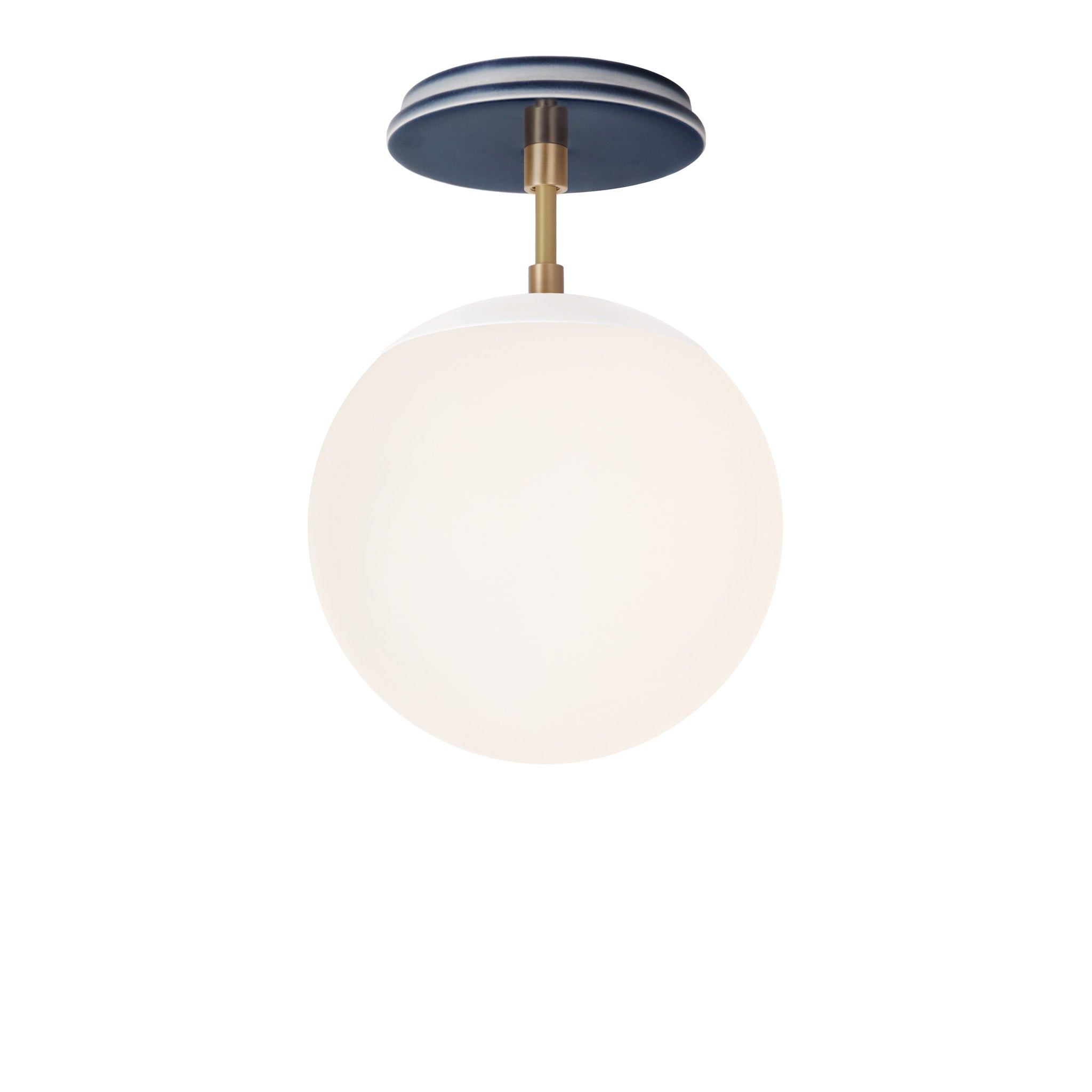 Alto Surface 8" shown in White with Brass and an Indigo Blue Swift Ceramic Canopy