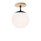 Alto Surface 8" shown in Matte Black with a Maple Wood Canopy