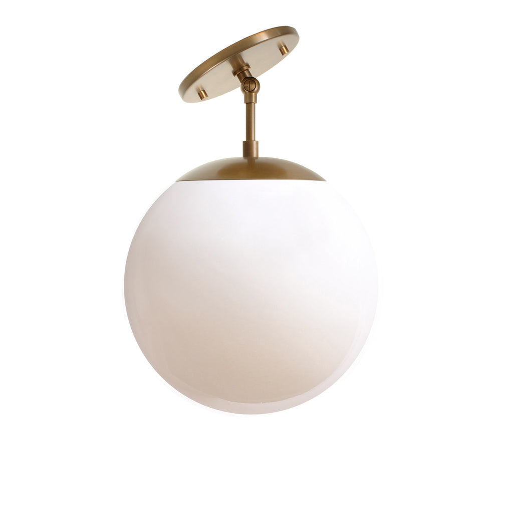 Alto Surface 10" for Vaulted Ceiling shown in Heirloom Brass with an Opal 10" globe