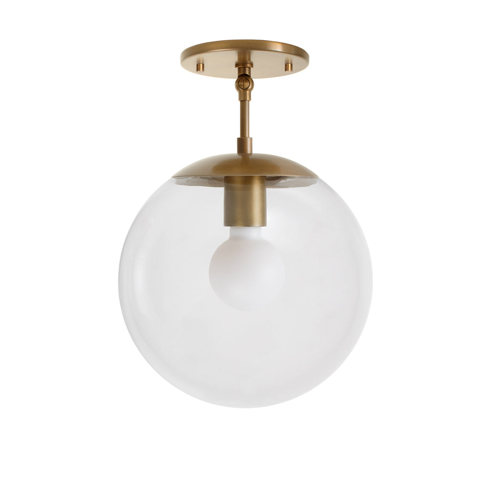 Alto Surface 10" for Vaulted Ceiling shown in Heirloom Brass with a Clear 10" globe