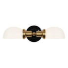 Archie Double shown in Heirloom Brass with a Gloss Black Ceramic Canopy