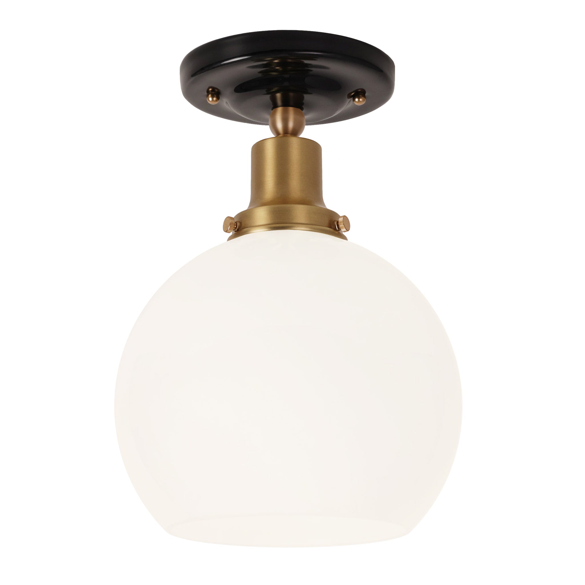 Beatrix Surface shown in Heirloom Brass with a Gloss Black Ceramic Canopy