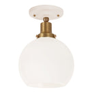 Beatrix Surface shown in Heirloom Brass with a Gloss White Ceramic Canopy