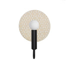 Edith ADA Sconce shown in Matte Black with a Natural White and Cream Quilted Ceramic Canopy