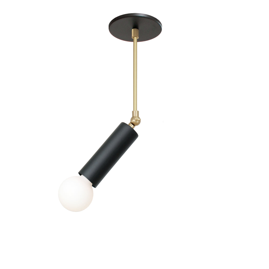 Fjord Spot Pendant shown in Matte Black and Brass with Standard Socket Placement. 