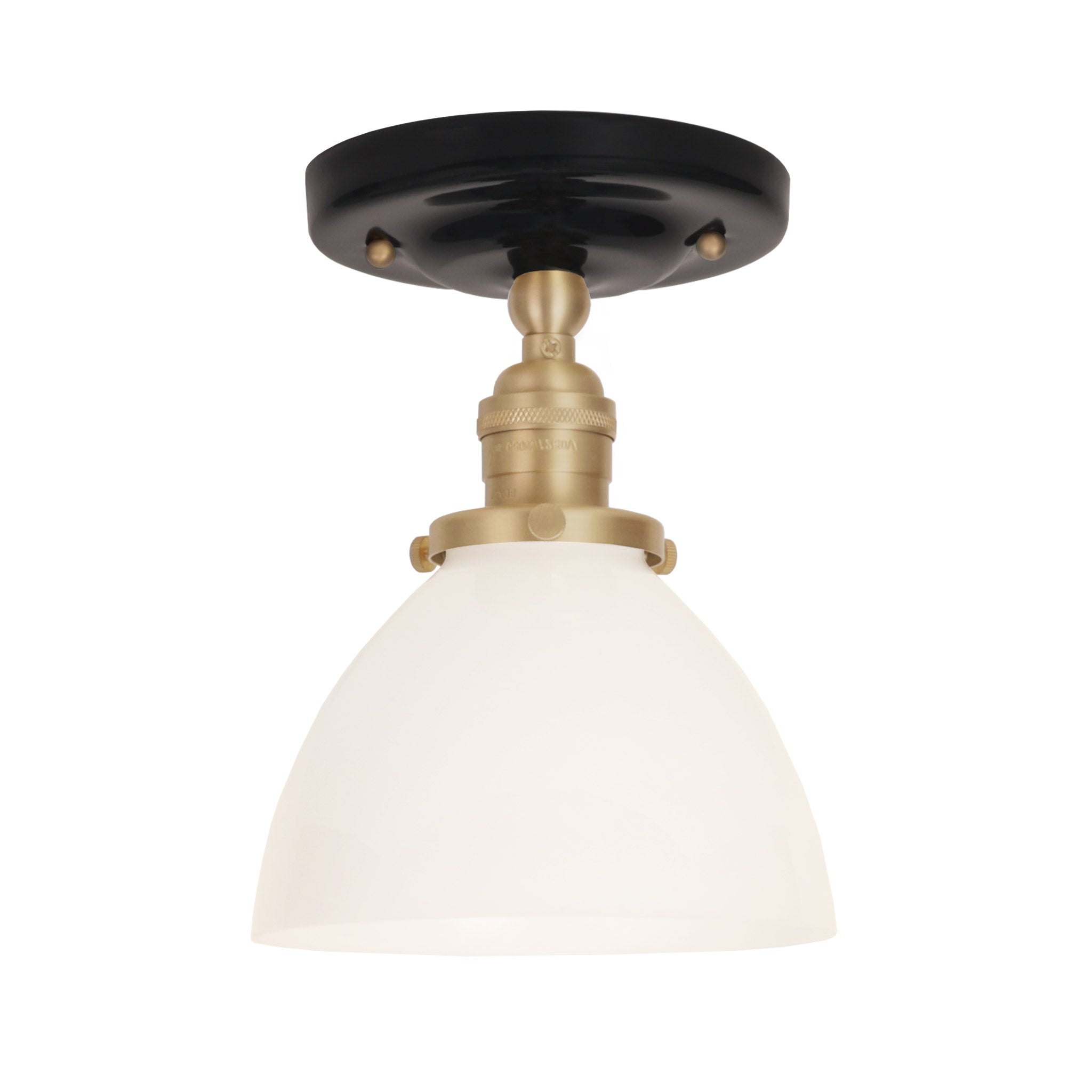 Grace Surface shown in Brass with a Gloss Black Ceramic canopy and Opal Glass shade
