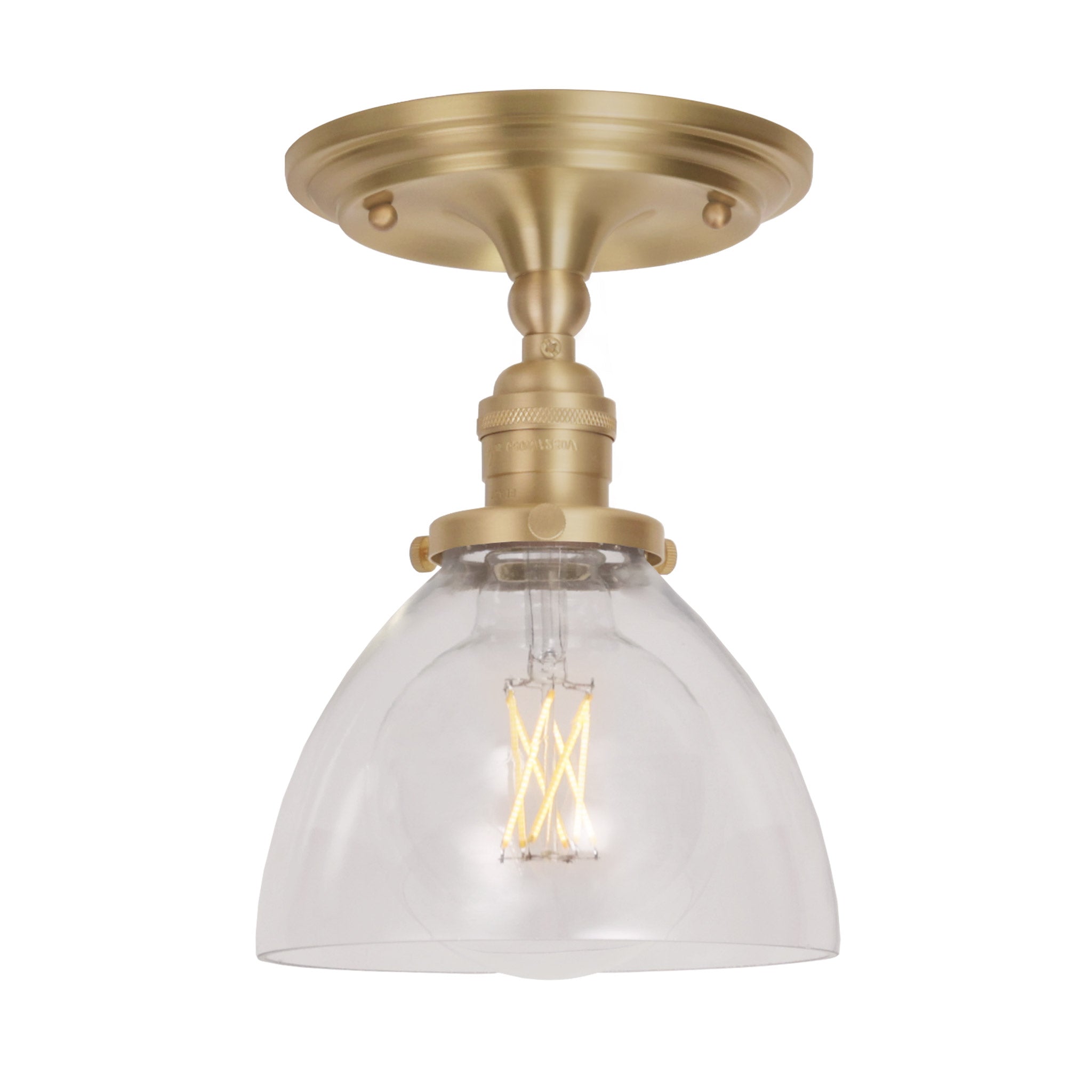 Grace Surface shown in Brass with a Clear Glass shade