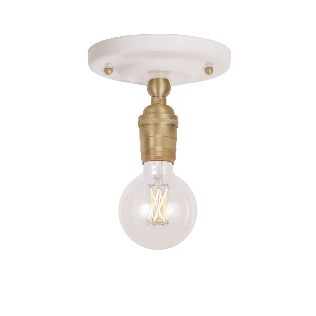 Grace Surface shown in Brass with a Gloss White Ceramic canopy and no shade