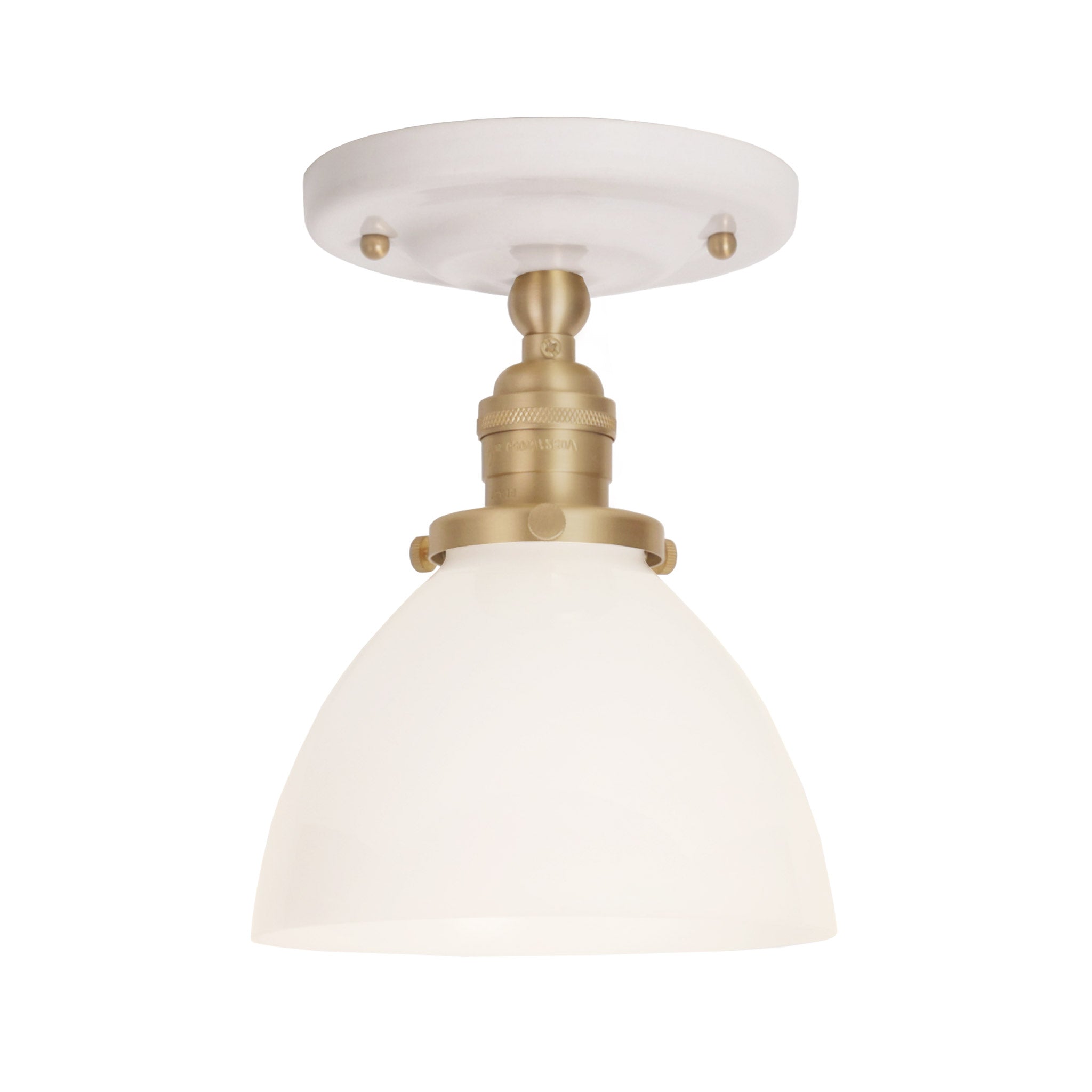 Grace Surface shown in Brass with a Gloss White Ceramic canopy and Opal Glass shade