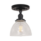 Grace Surface shown in Graphite Patina with a Gloss Black Ceramic canopy and Clear Glass shade