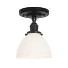 Grace Surface shown in Graphite Patina with a Gloss Black Ceramic canopy and an Opal Glass shade