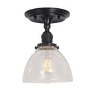 Grace Surface shown in Graphite Patina and a Clear Glass shade