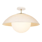 Maru Surface with a Natural shade shown in Brass with a Bone Ceramic canopy