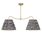 Oxford Grand Double Pendant shown in Brass with Trulli Auburn Shades
