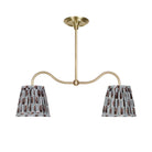 Oxford Petite Double Pendant shown in Brass with Trulli Auburn Shades