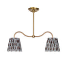 Oxford Petite Double Pendant shown in Heirloom Brass with Trulli Auburn Shades