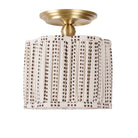 Oxford Surface shown in Brass with an Aspen Coco Scallop 10" Shade