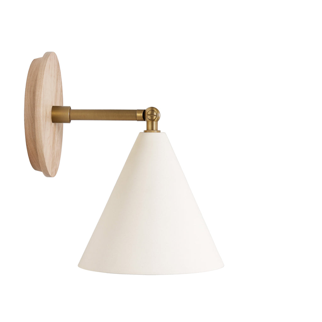 Petra Ceramic Sconce shown in Heirloom Brass with a 3" rod and Maple Wood canopy