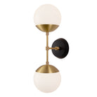Theo shown in Heirloom Brass and a Black Stained Wood Canopy