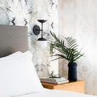 Theo shown in Matte Black with Opal 6" globes. Interior design by Nina Freudenberger. Photo by Brittany Ambridge