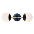 Theo shown in Matte Black with Brass and an Indigo Blue Star Ceramic Canopy