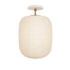 Umi Surface shown in Heirloom Brass with a Bone Ceramic Canopy