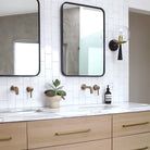 Audrey 8" shown in Matte Black with Brass with a Clear 8" globe. Interior design by Amanda Dawbarn. Photo by Jeff Mindell