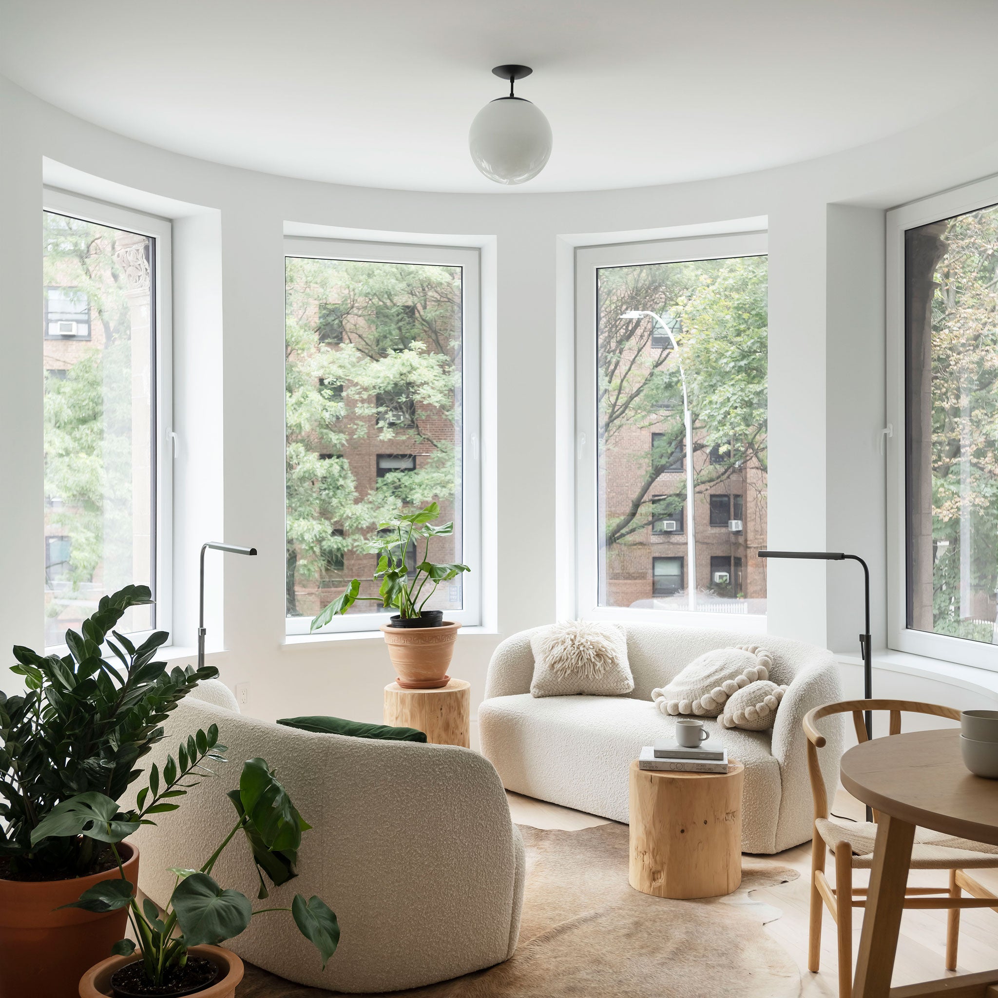 Alto Surface 12" in Matte Black with an Opal 12" Globe.  Interiors by the Brooklyn Home Company