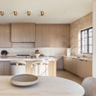 Cape Longs in Heirloom Brass. Interior Design by Tomlenovich