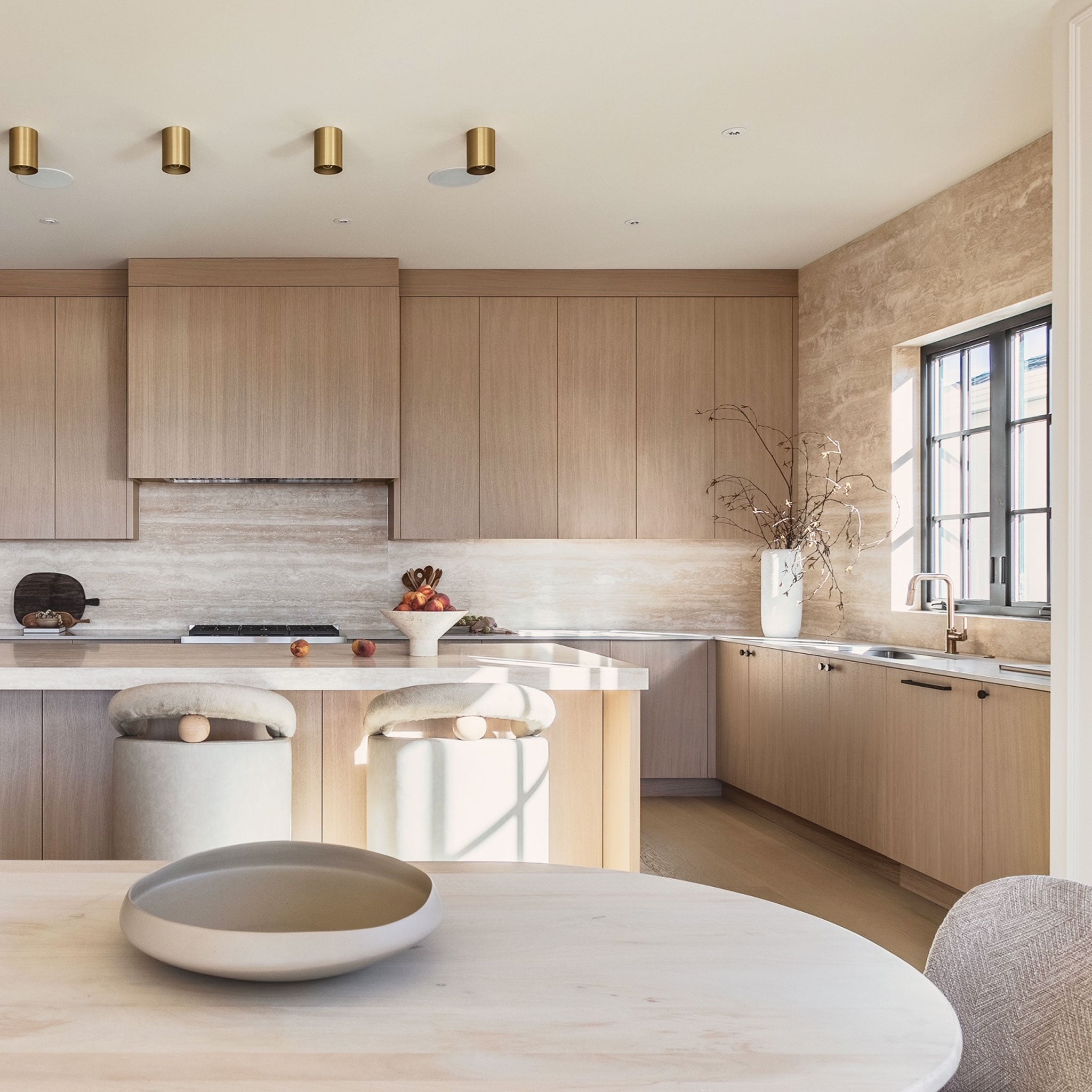 Cape Longs in Heirloom Brass. Interior Design by Tomlenovich