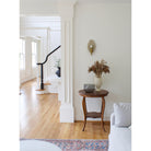 Clare Ceramic Sconce shown in Heirloom Brass with a Gloss Crackle Glaze 