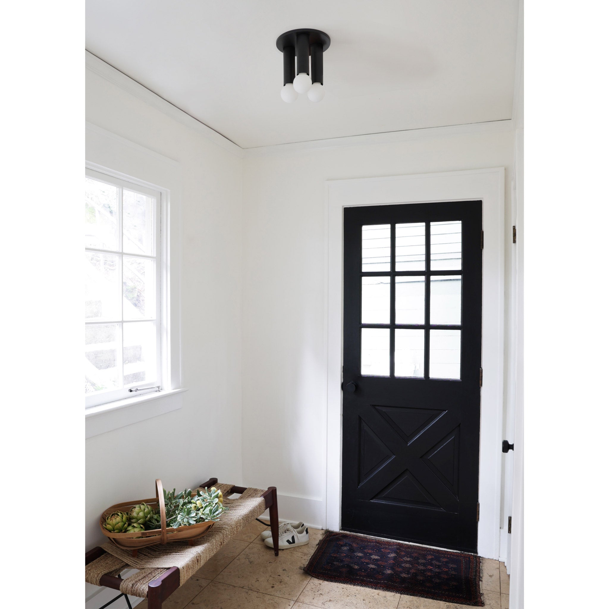 Fjord 3 Surface shown in Matte Black and Tala Sphere II Led Bulbs