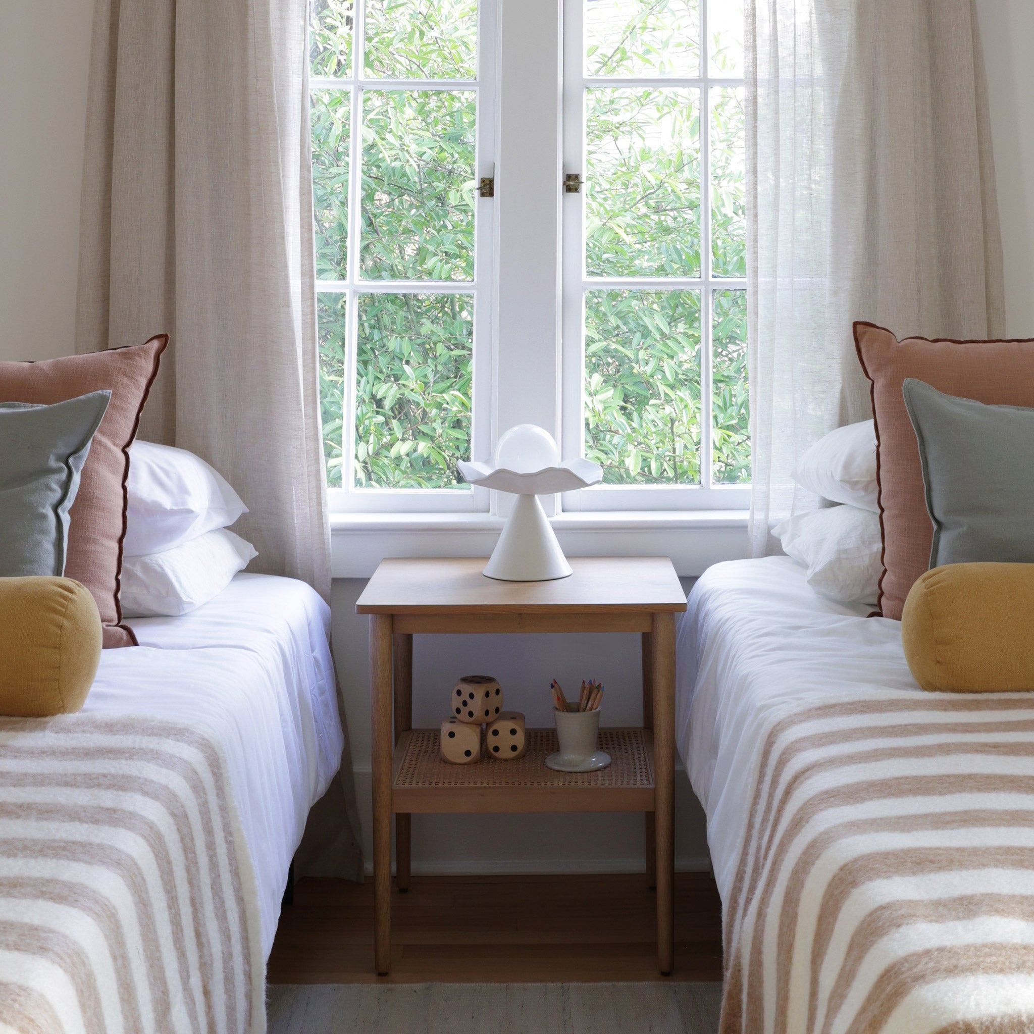 Loie Lamp shown in Natural White Glaze ceramic