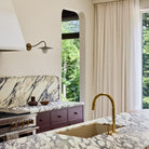 Marie Sconce shown in Heirloom Brass. Interior Design by Sarah Sherman Samuel. Photography by Daniel Peter