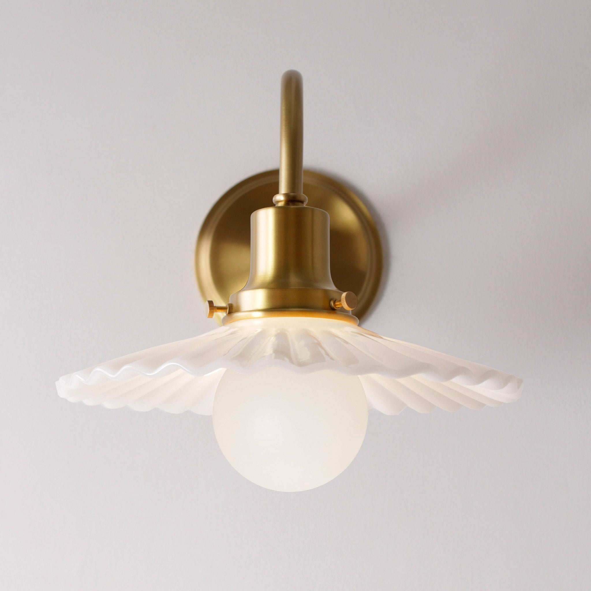Marjorie Petite Sconce shown in Heirloom Brass