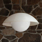 Maru Pendant with a Natural shade shown in Heirloom Brass 